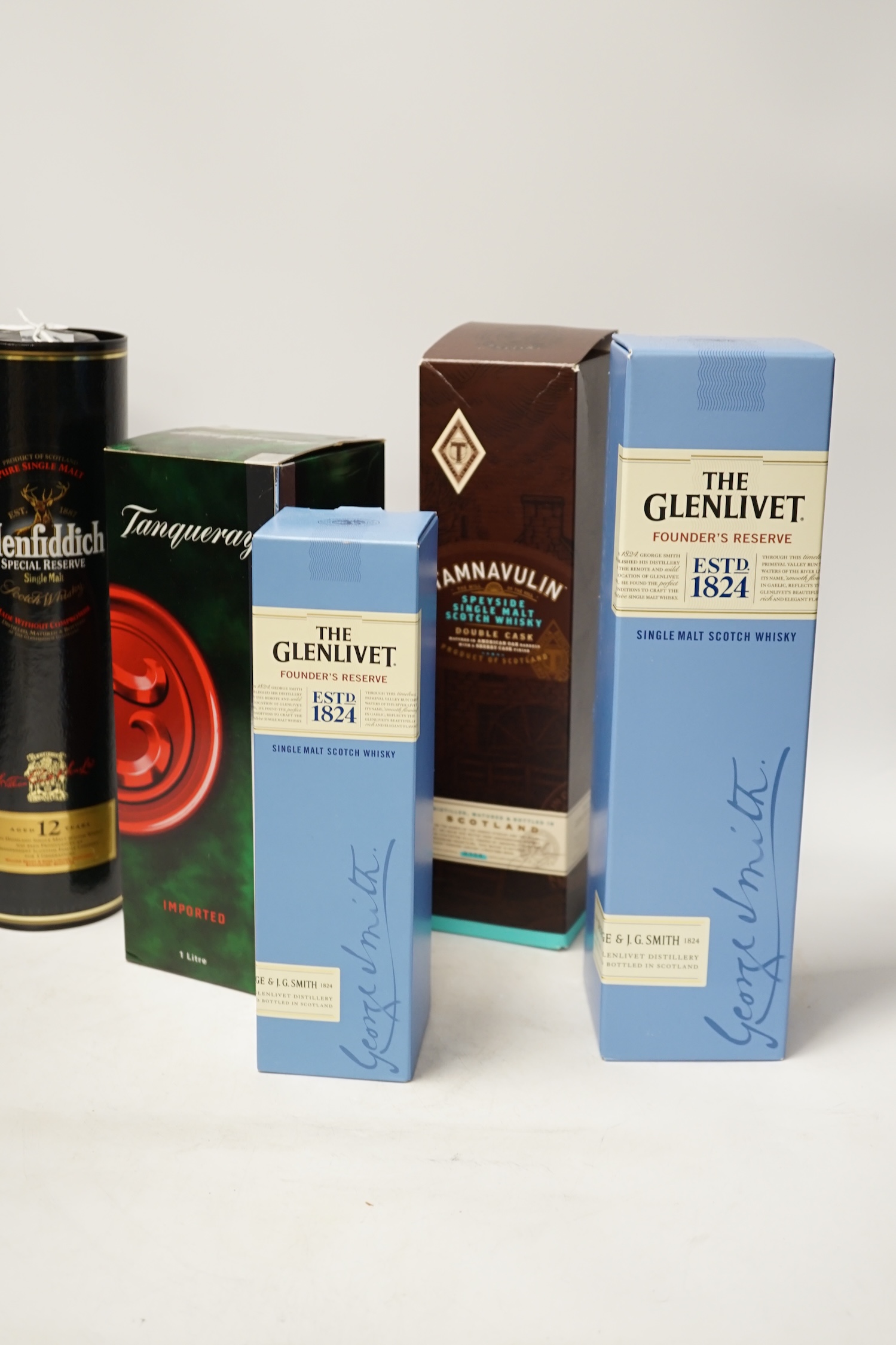 Five bottles of spirits including Glenfiddich single malt whisky and Tanqueray